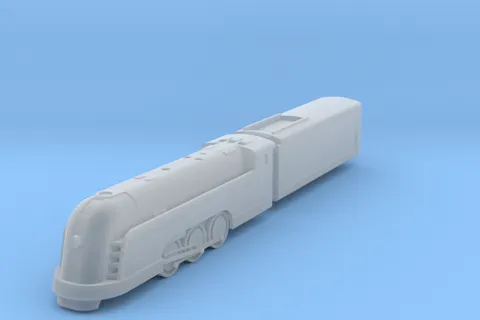 Modèle réduit de locomotive à vapeur blanche sur fond bleu.