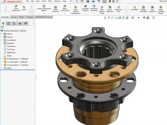 Modèle CAD d'une roue de direction avec composants en noir et or, visible dans SOLIDWORKS.