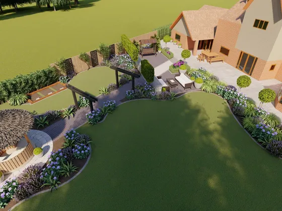 Vue aérienne d'un jardin spacieux attenant à une maison avec espace verts, terrasse, pergola, mobilier de jardin et plantations fleuries.