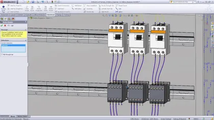 Schéma 3D d'un système de distribution de bandes avec des composants électriques, connectés par des câbles dans un logiciel de conception CAD.