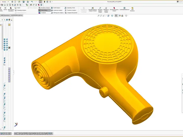 Modélisation 3D d'un robinet de lavabo en logiciel SolidWorks, couleur jaune, vue éclatée montrant la partie supérieure perforée et le corps du robinet.