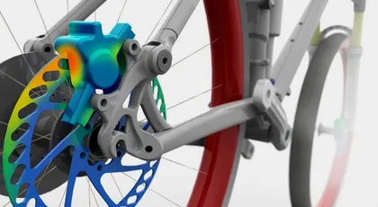 Détail d’un vélo de montagne avec vue sur la suspension et le système de freinage, mis en évidence par une visualisation thermique.